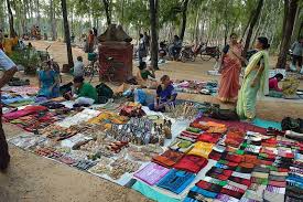 Stalls under trees at Sonajhuri Haat