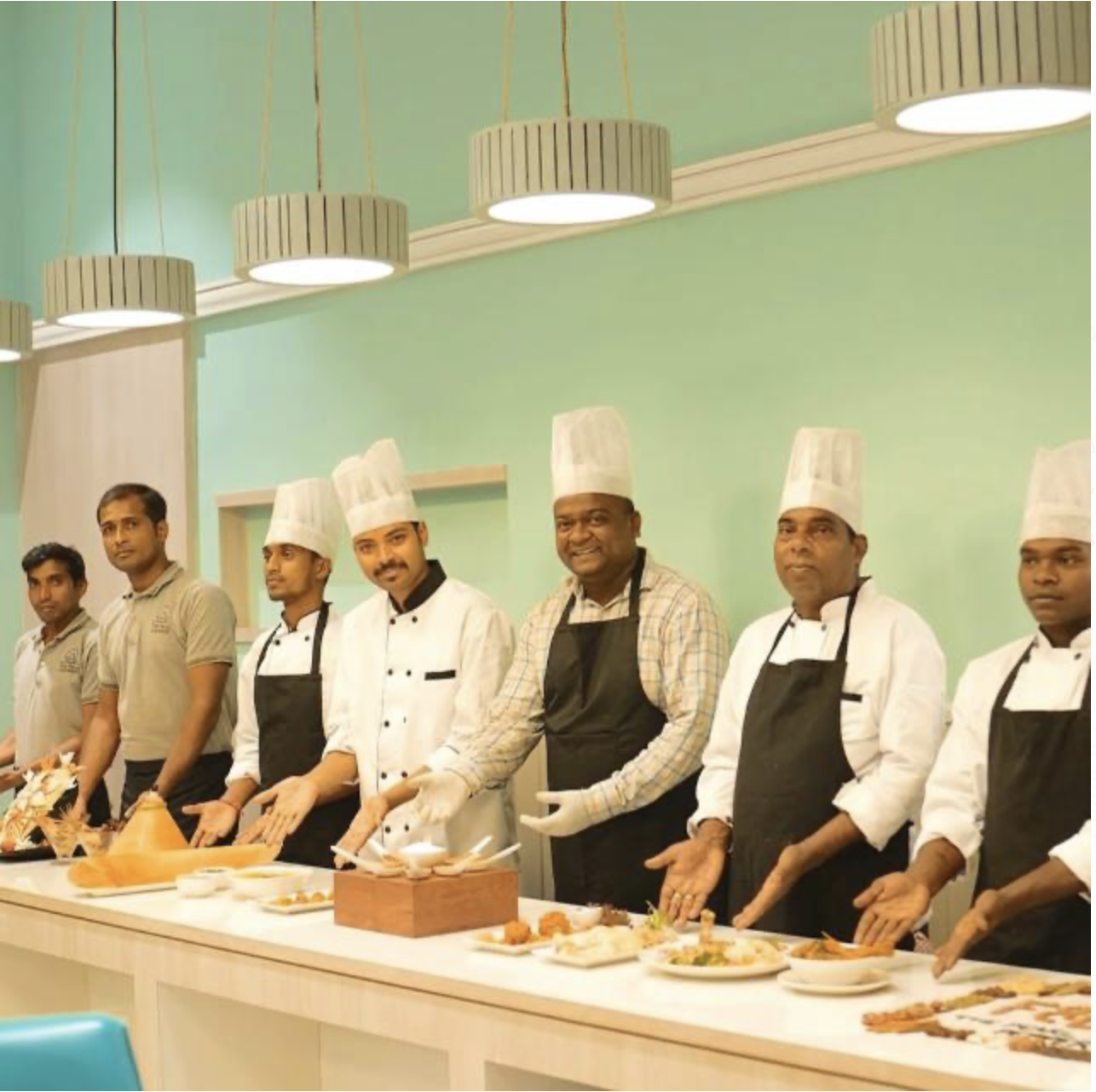 The Pearl Club Resort staff — hearts and hands at work through day and night